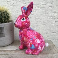 Image sur Joyeux lapin de Pâques en céramique en rosé avec des fleurs 