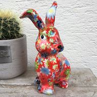Image sur Joyeux lapin de Pâques en céramique  en rouge avec des fleurs